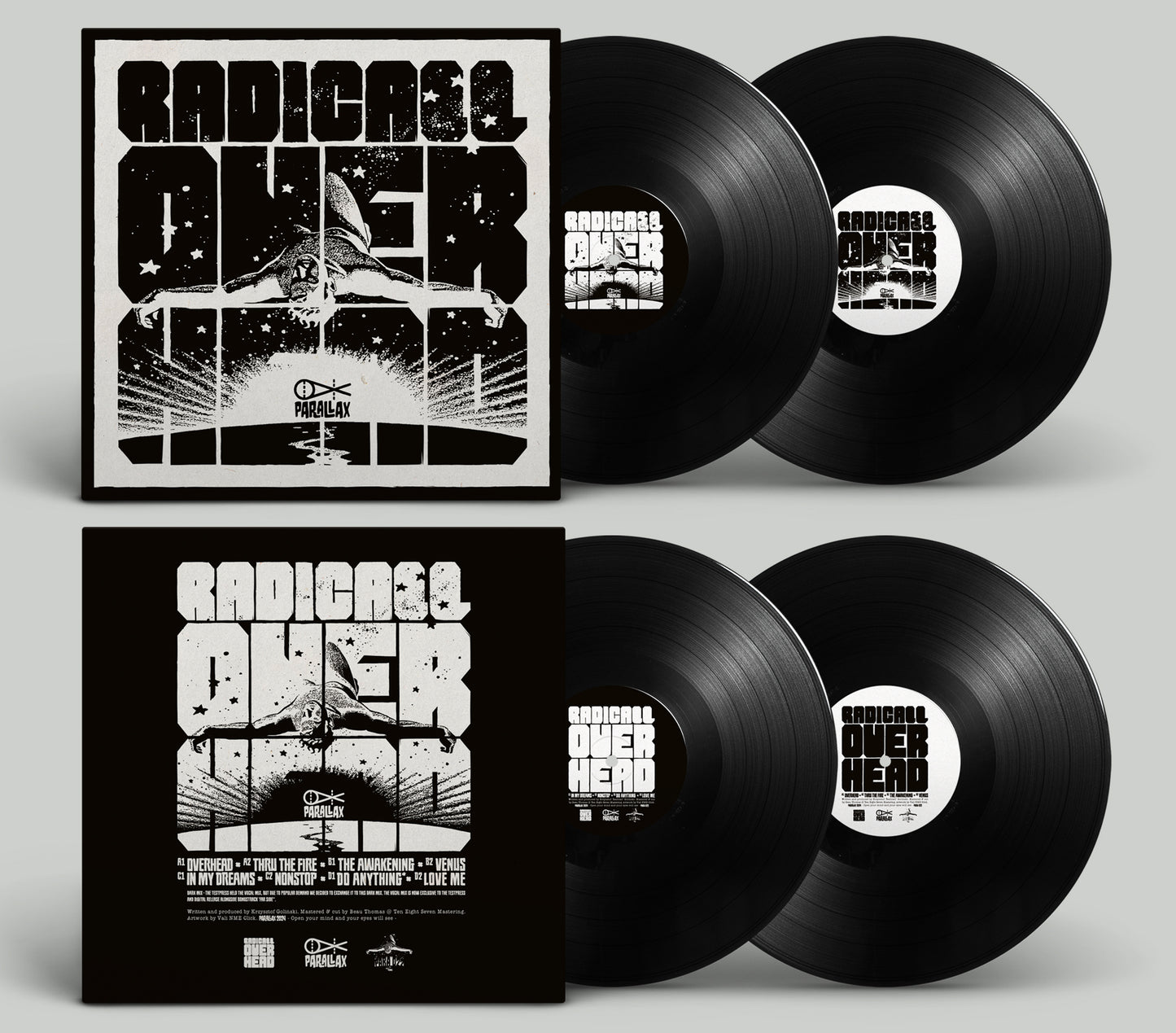 Vinyl records with black and white cover design on a gray background