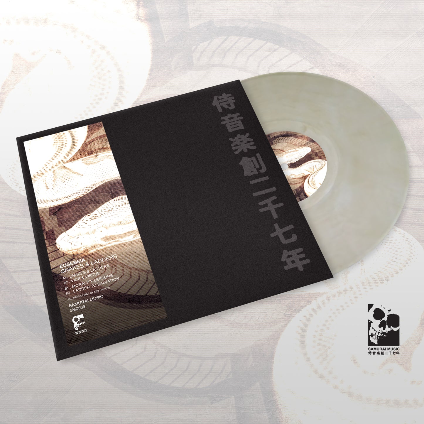 Vinyl record with black cover on a white textured surface