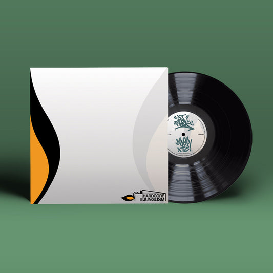 Vinyl record with a white label and a matching sleeve on a green background