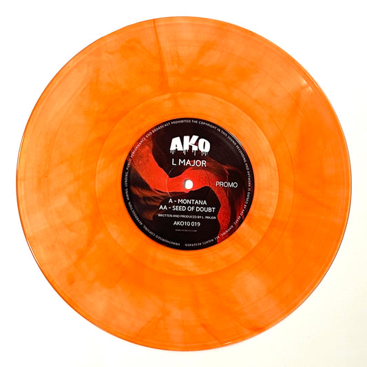 Orange vinyl record with a black label on a white background