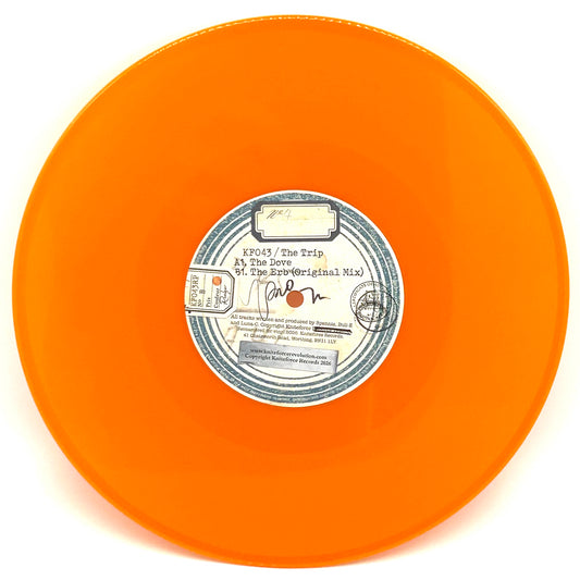 An orange vinyl record with a central label, photographed from directly above on a white background.