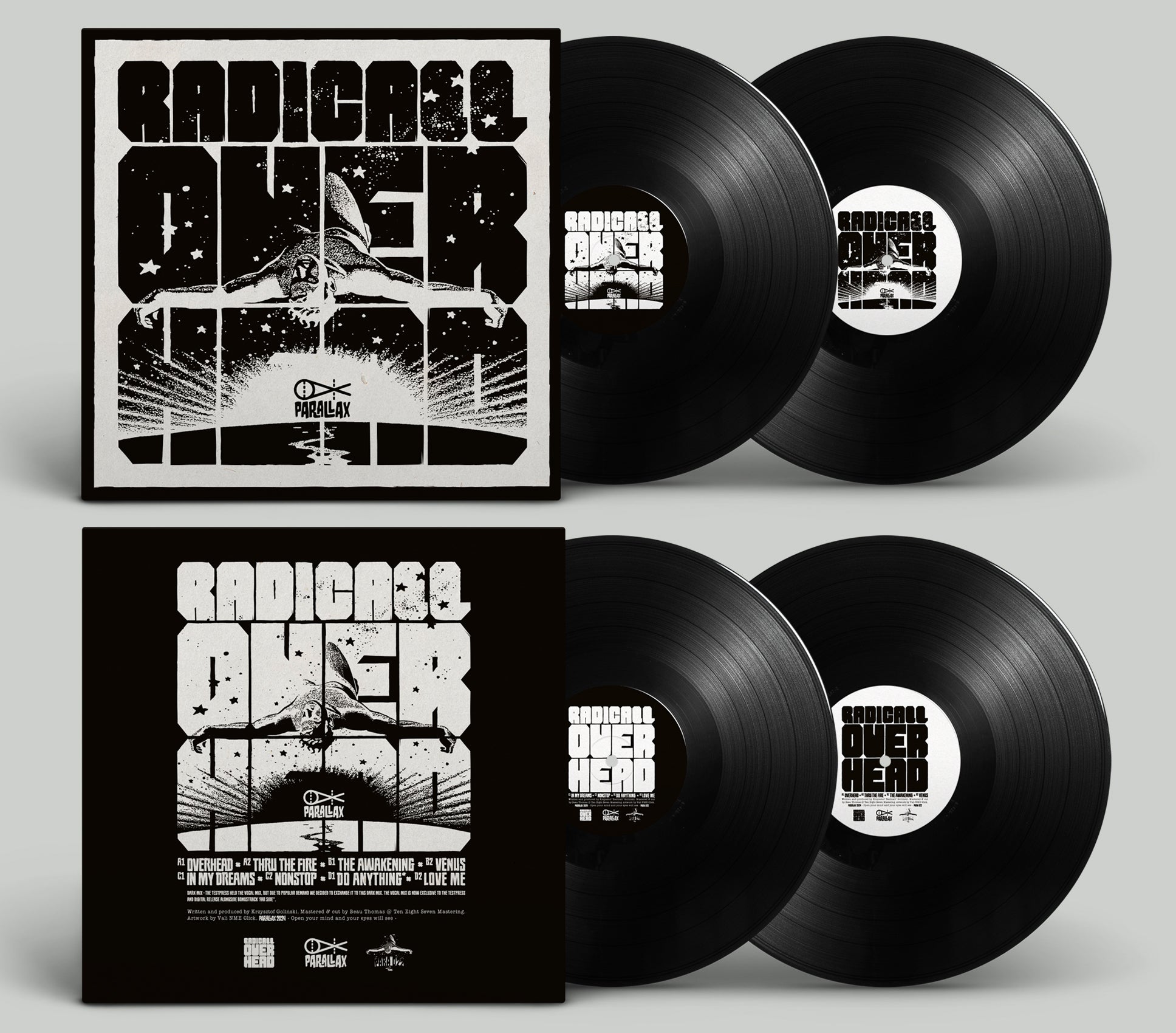 Vinyl records with black and white cover design on a gray background