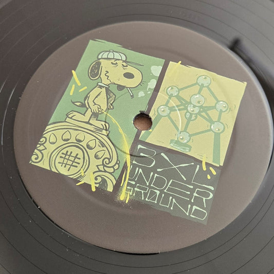 Vinyl record with a cartoon character and text on the label