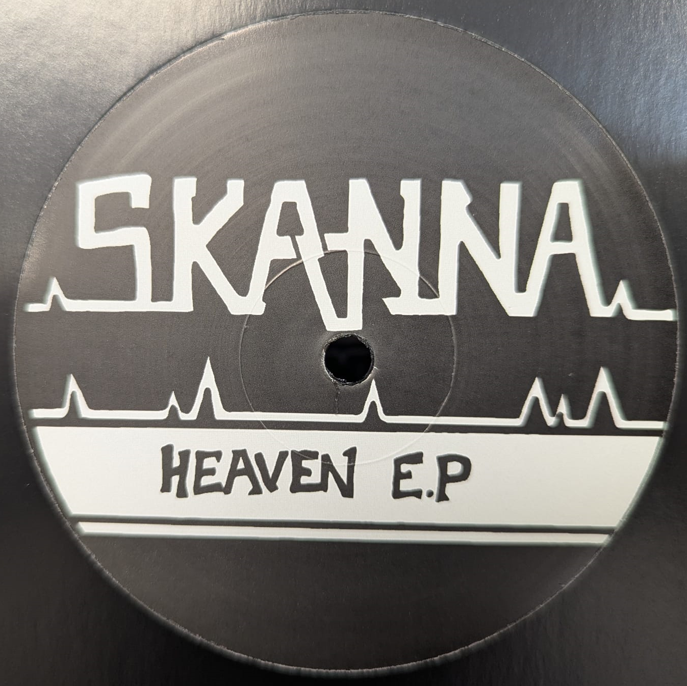 label art of Skanna - Heaven EP - 12" vinyl release on Skanna